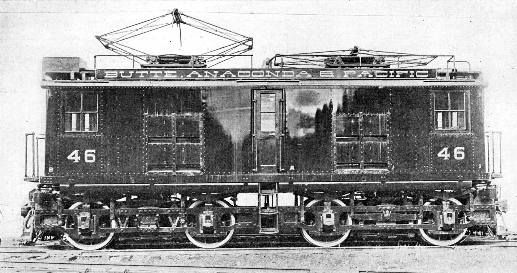 Boxy electric locomotive number 46 of the Butte, Anaconda and Pacific with pantographs raised